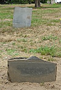 broken slate gravestone