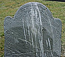 headstone before cleaning
